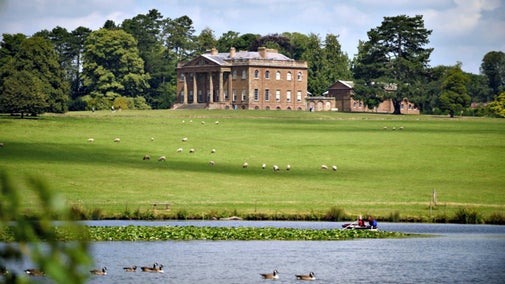 Berrington Hall from the lake on purple parkland walk